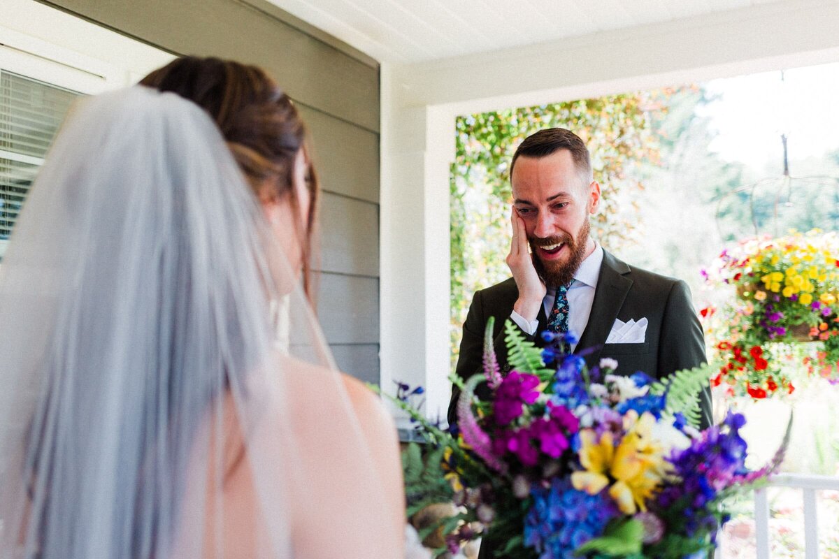 groom freaking out over his beautiful bride during their first look at Airbnb before their Washington Elopement