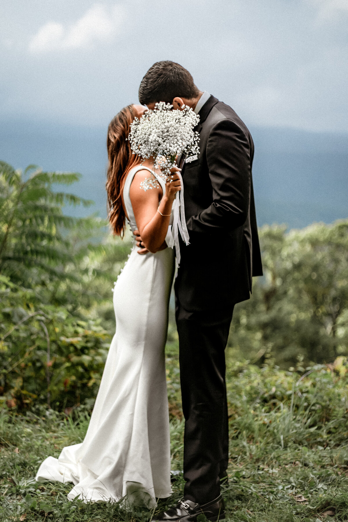 Salem VA wedding and Elopement photographer earthy and moody Charleigh Roberts Photography artsy earthy moody virginia roanoke va east coast north carolina nc pearl veil babys breath kiss happy blue ridge mountains parkway