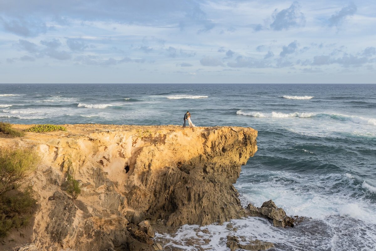 Amazing cliffside Kauai wedding photo by Karma Hill Photography