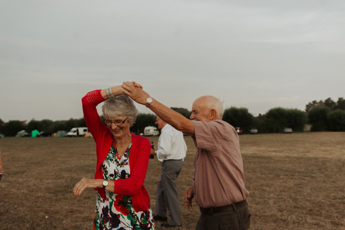 guests dancing in a field