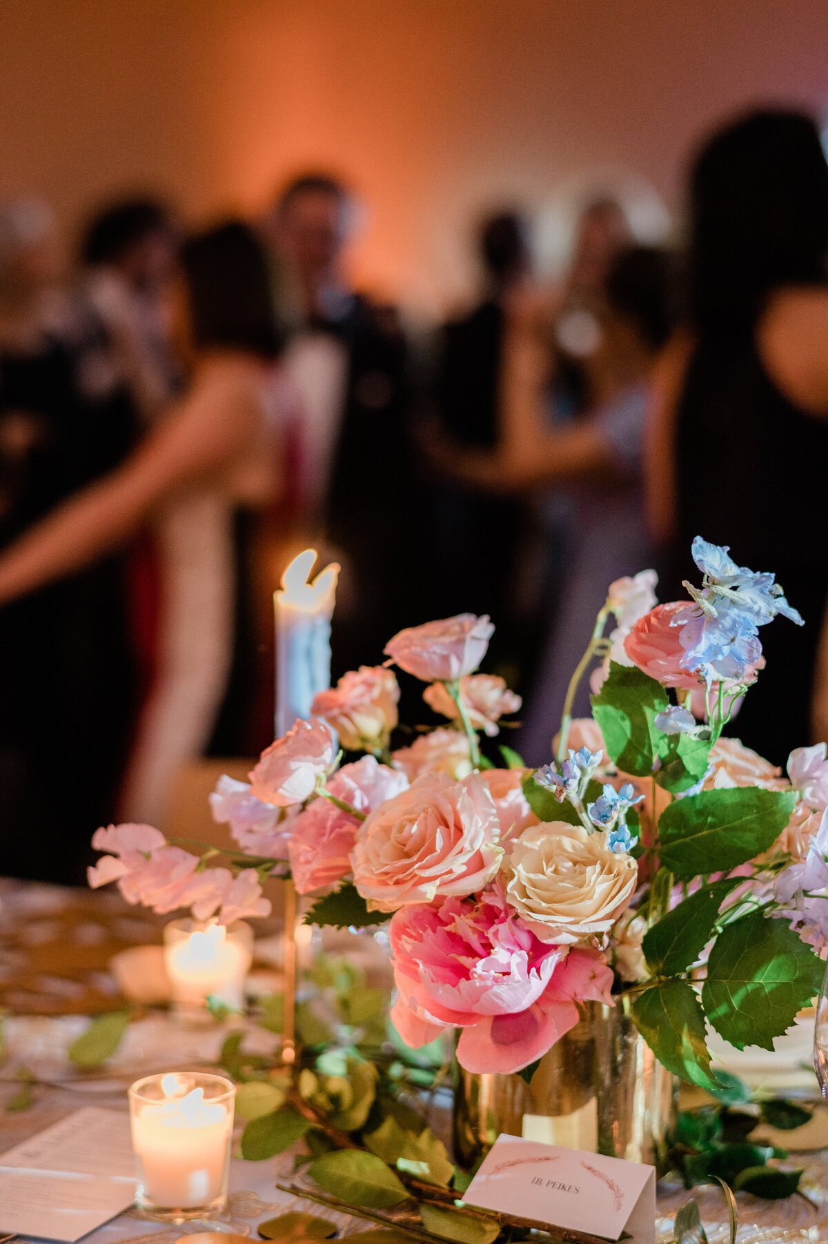 Pink florals sit on top of William Vale wedding reception 