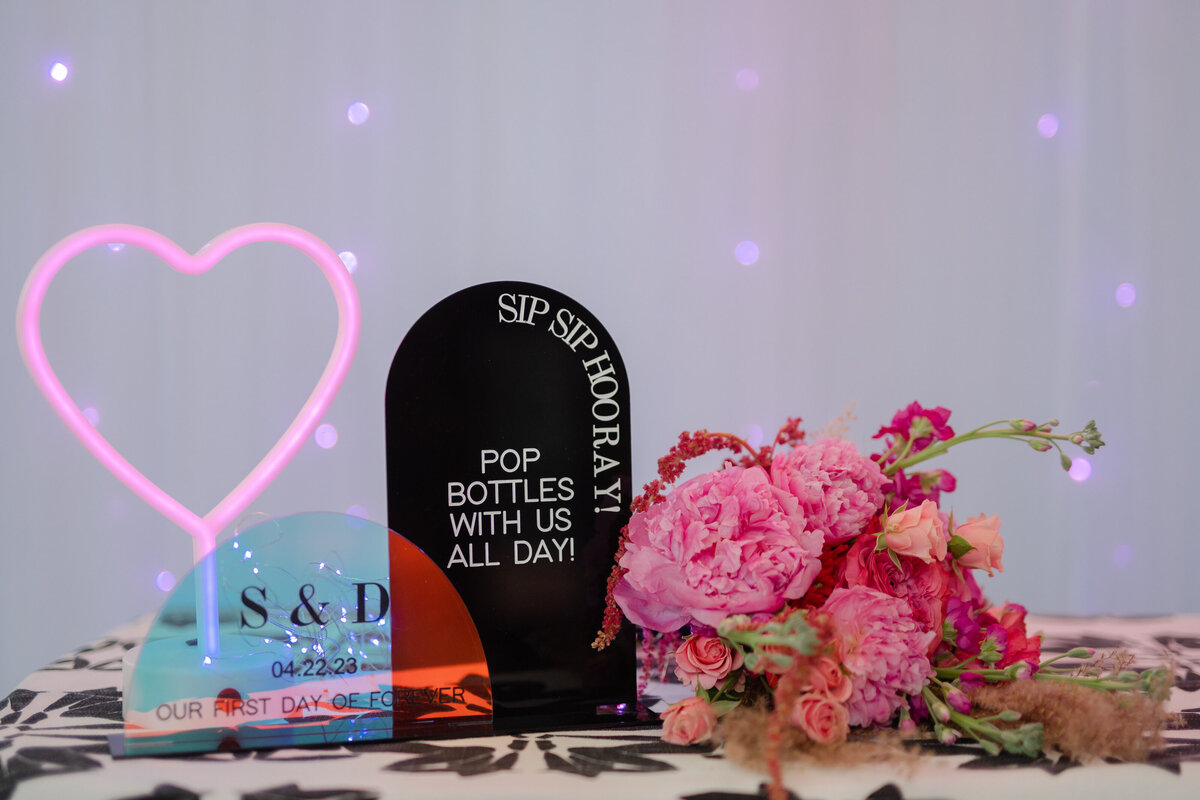 Black and pink wedding tablescape