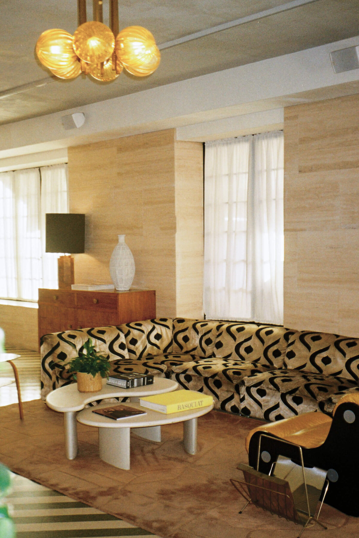 Stylish mid-century inspired lounge area at Soho House Rome wedding venue
