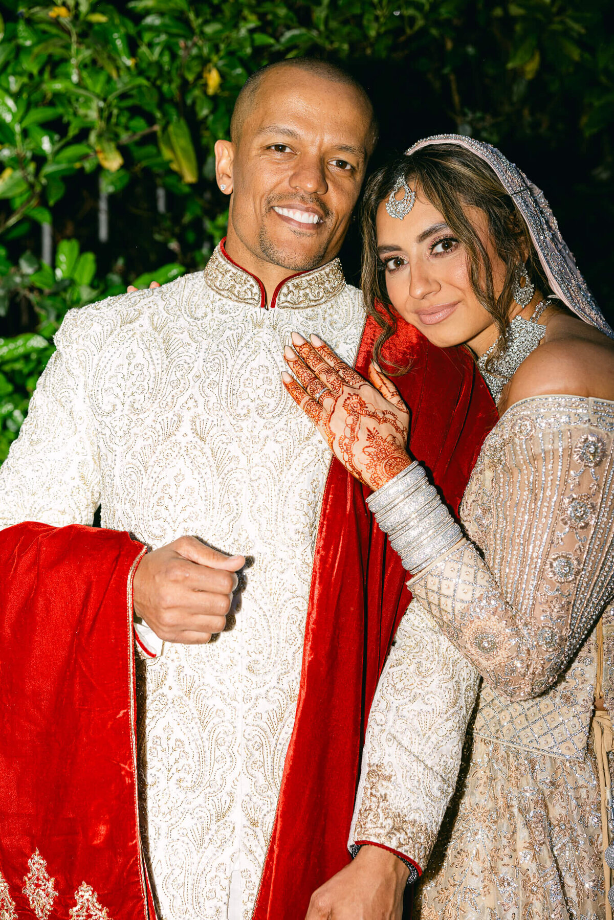 A wedding photo of the bride and groom embrassing each other after their ceremony in Dublin Ireland
