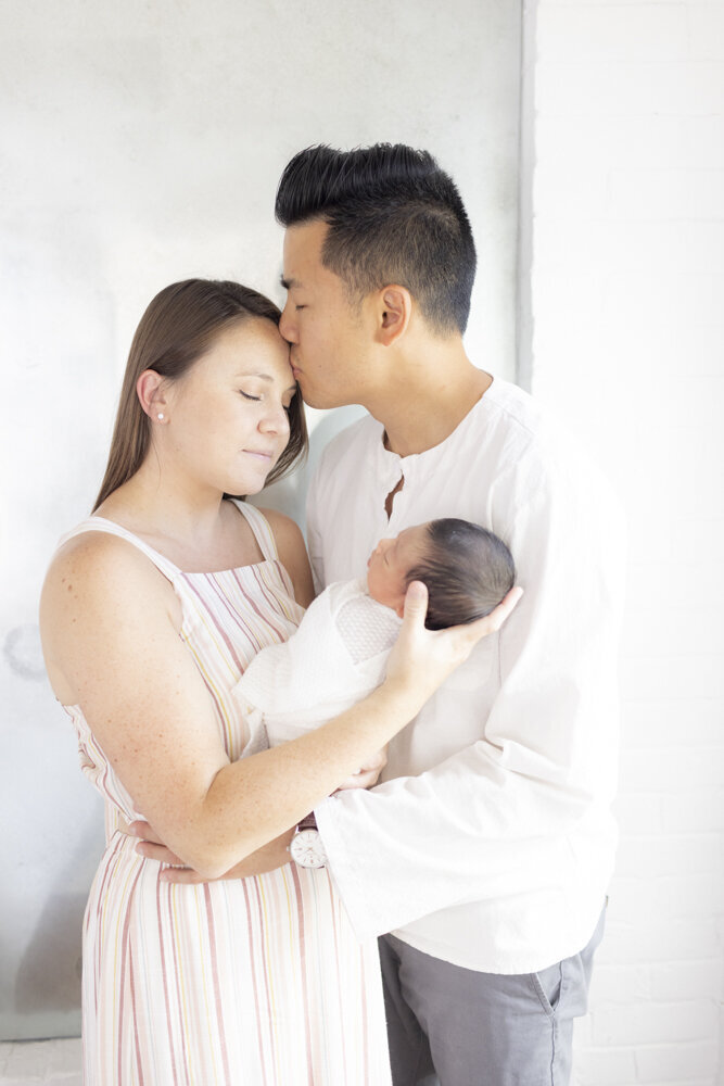 young couple with baby boy