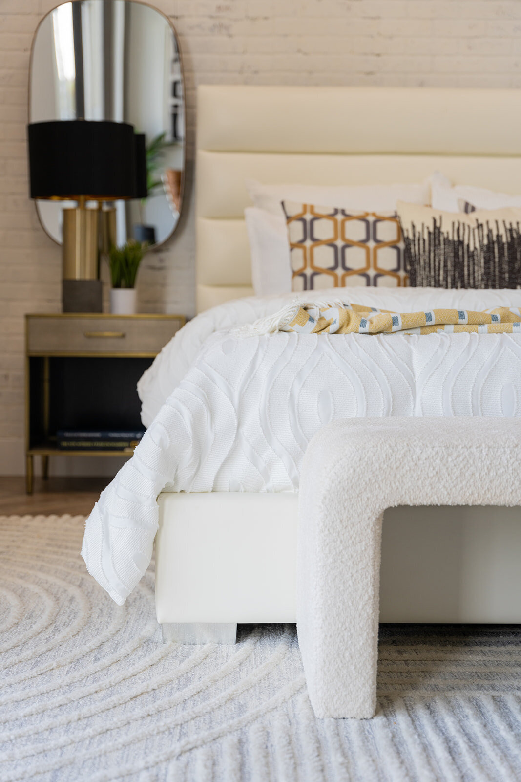 Bedroom with white, black and gold accents