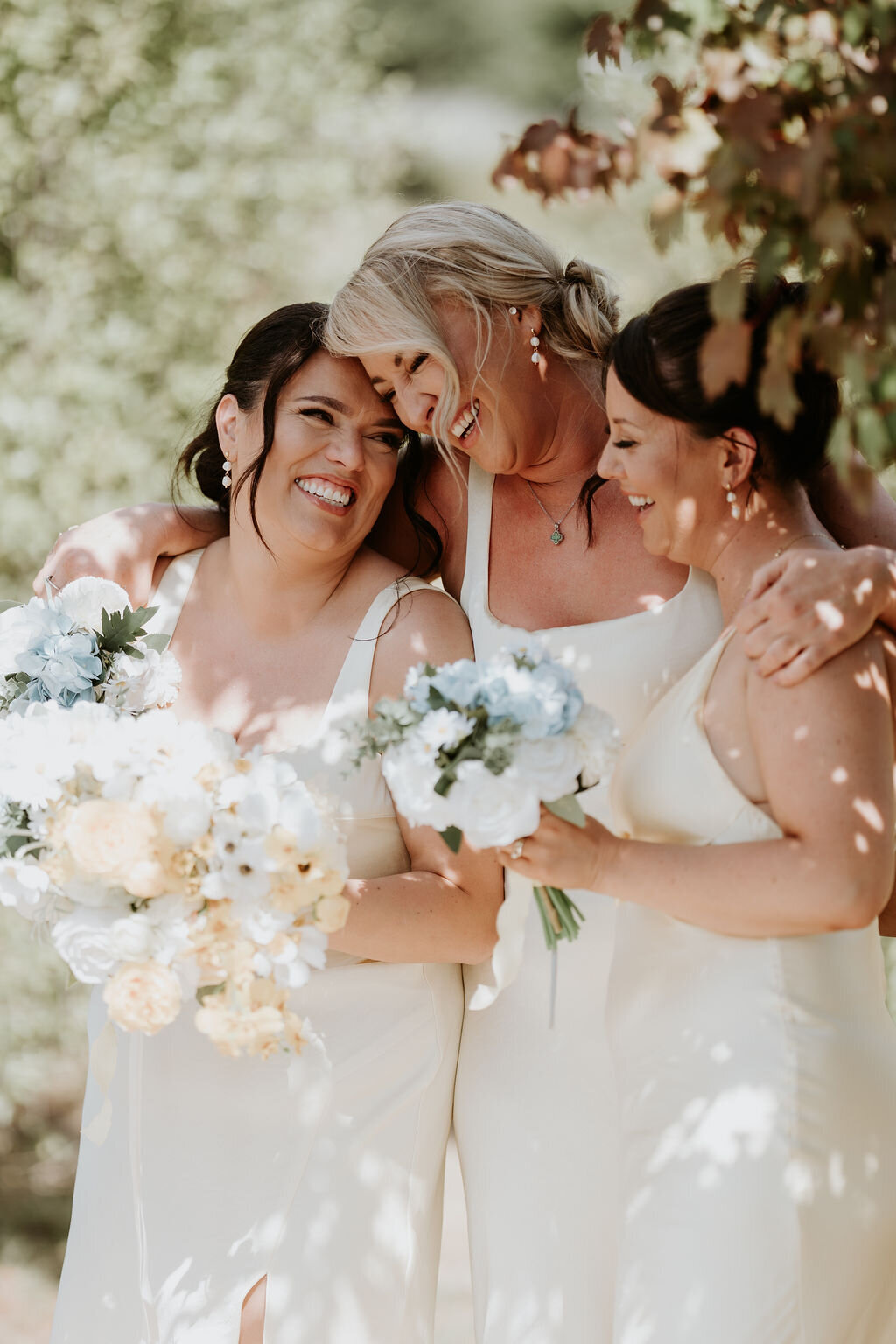 Bridesmaids hugging during ceremony at yarra valley wedding