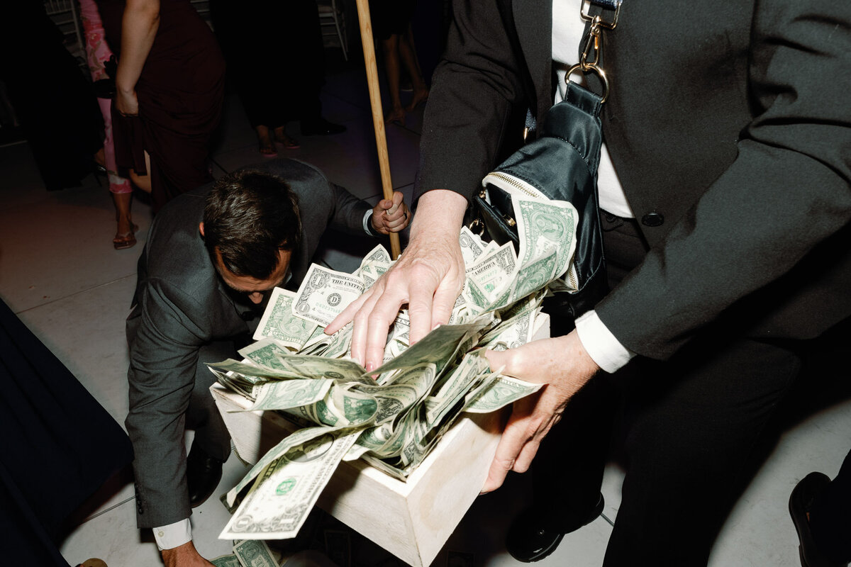 greek money tradition at wedding reception at the canoe place in the hamptons ny