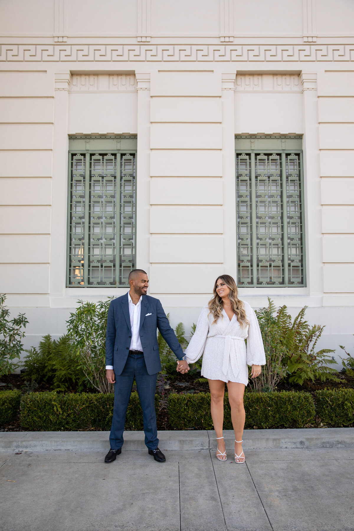 Couple holding hands at the Griffith observatory