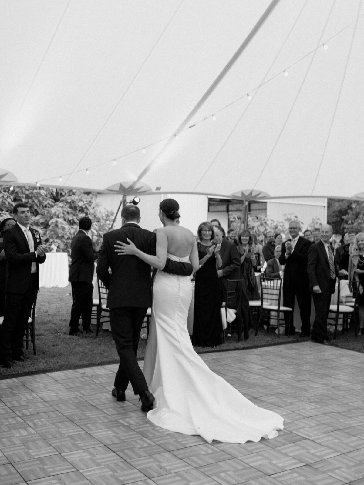 Elegant tented reception at private estate wedding.
