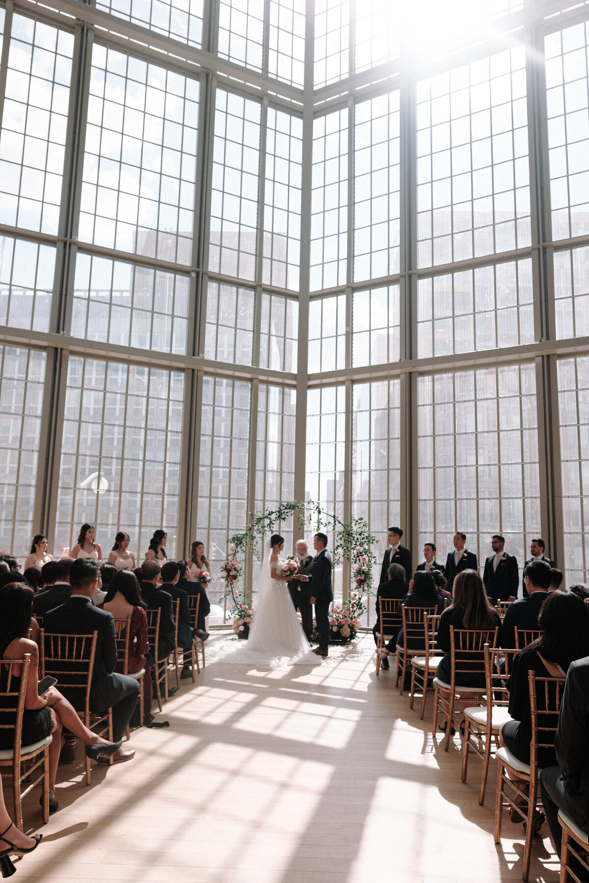 Beautiful light coming through the window during wedding ceremony at the national arts center