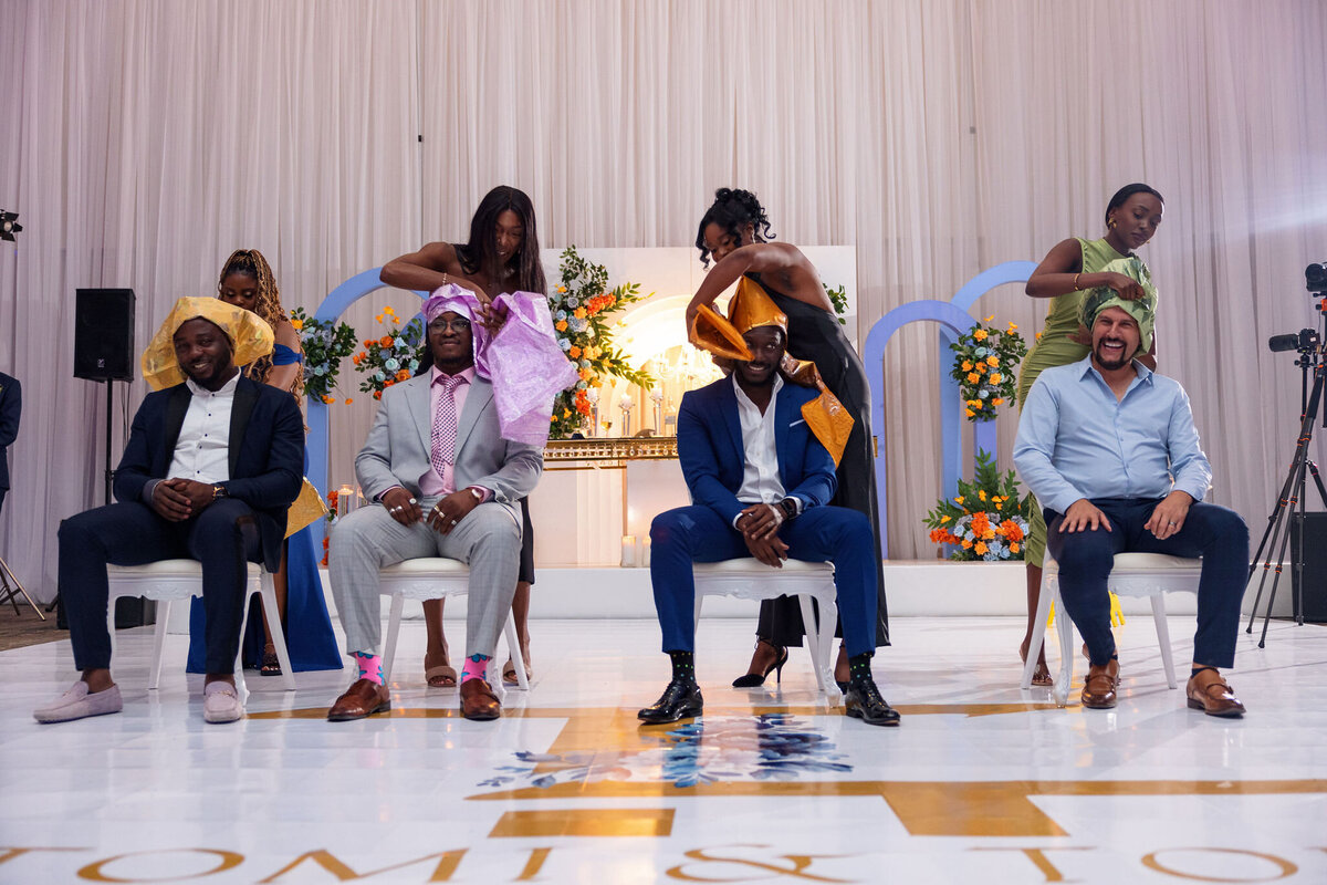 Tomi and Tolu Oruka Events Ziggy on the Lens photographer Wedding event planners Toronto planner African Nigerian Eyitayo Dada Dara Ayoola ottawa convention and event centre pocket flowers Navy blue groom suit ball gown black bride classy  374