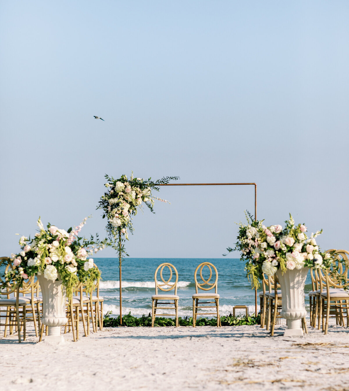 Hilton Head Island Wedding  | Omni Resort Wedding  | Trish Beck Events | HIlton Head Wedding Planner | Southeast Wedding Planner |  Vitor Lindo Photography | Beach Wedding Ceremony Arch with Floral
