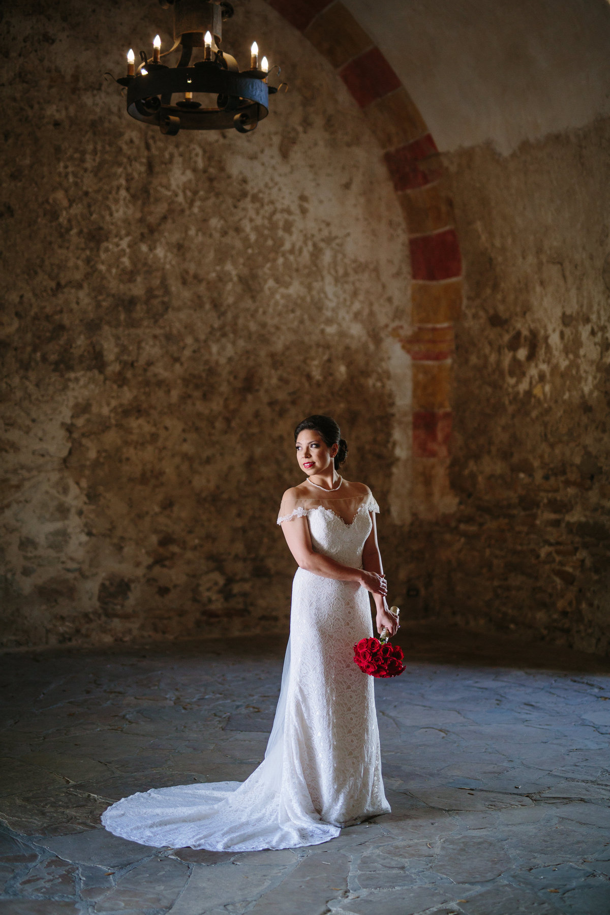 Bride inside Mission San Jose posing for her Bridal pictures by Expose The Heart Wedding Photography