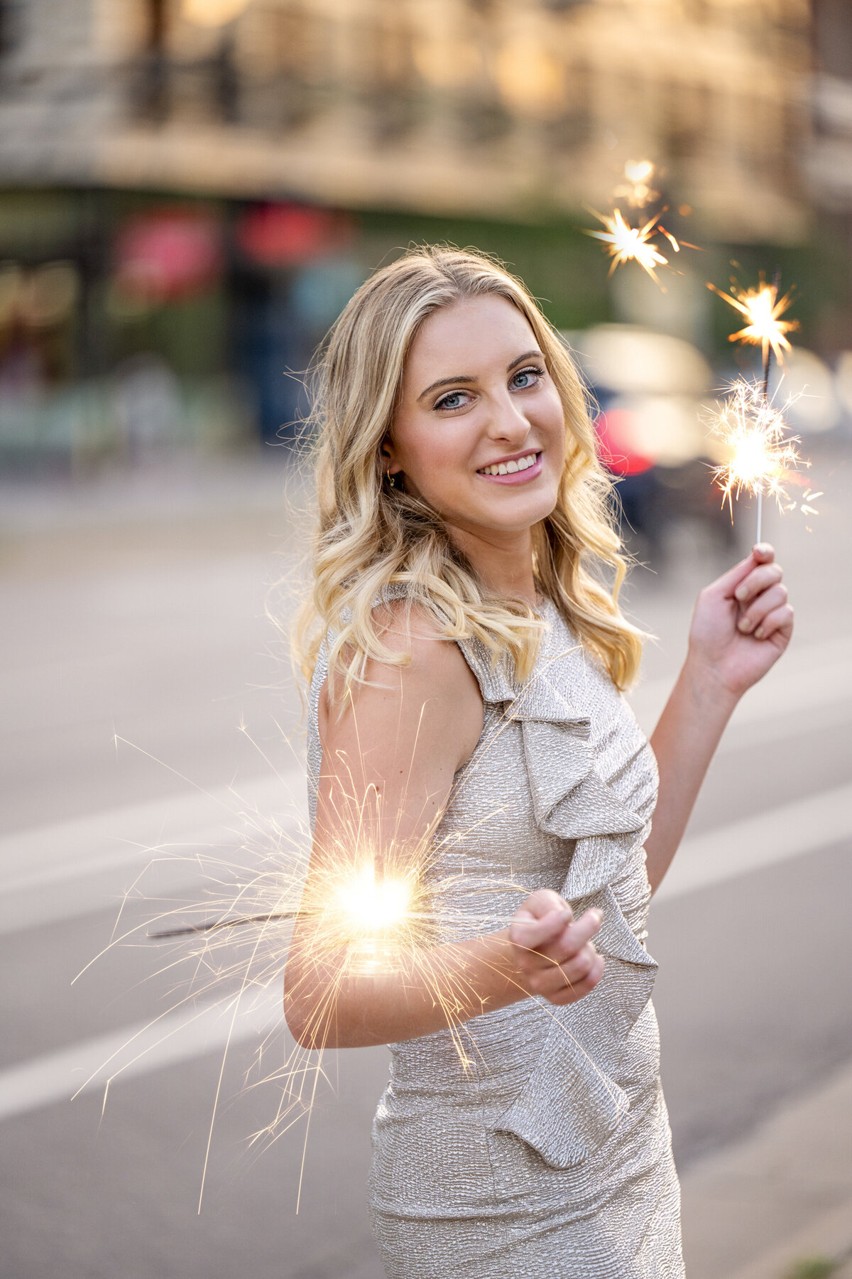 Blaine Minnesota high school senior  picture of girl in prom dress with sparklers