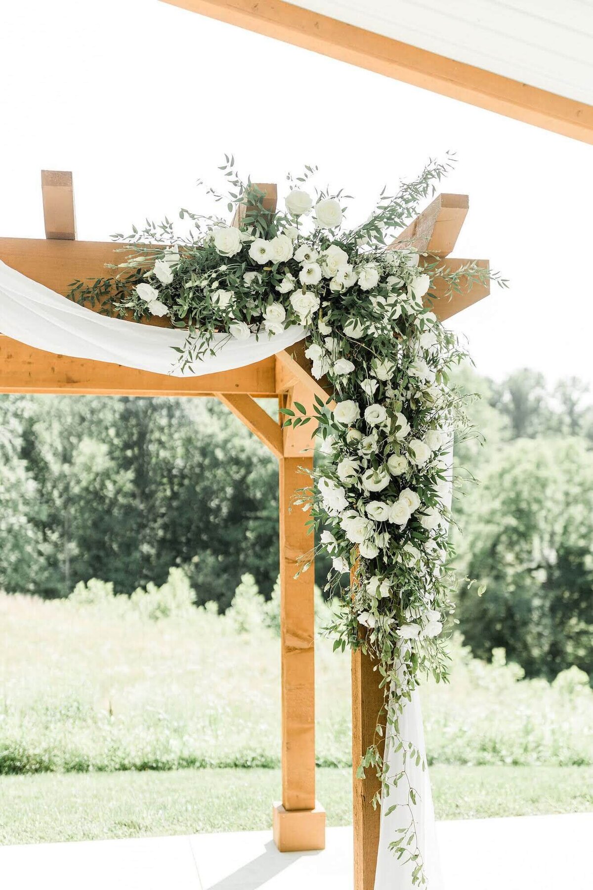 Michelle Kochvar wedding - pergola floral design