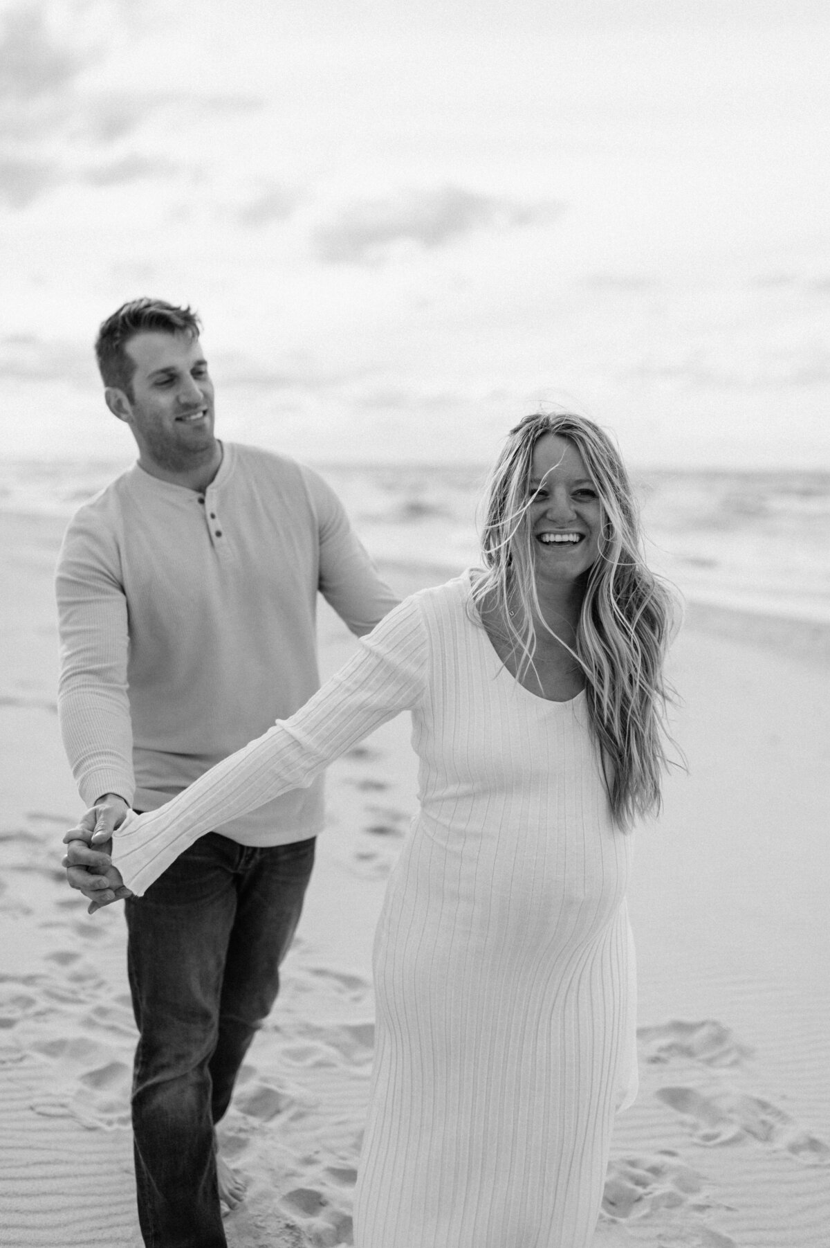 Maternity session walking on beach South Bend