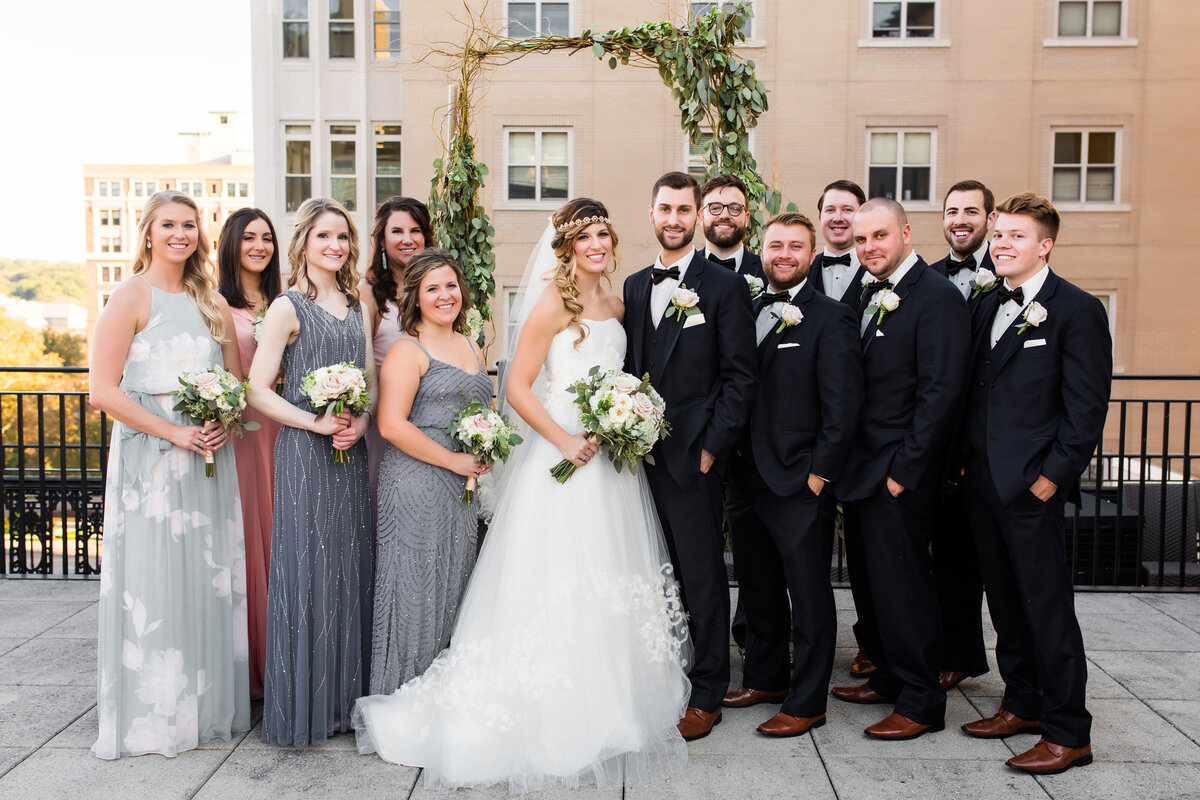 formal photo of a bridal party on a wedding day at university club