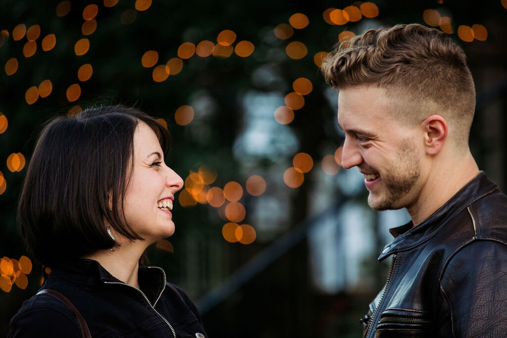 Two people looking at each other and smiling