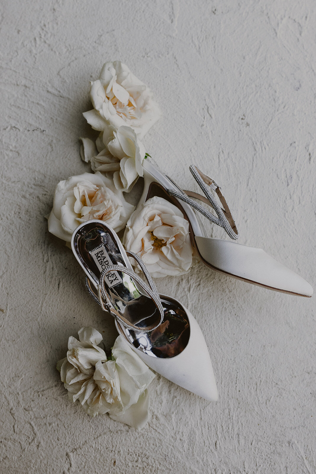 Wedding shoes and roses