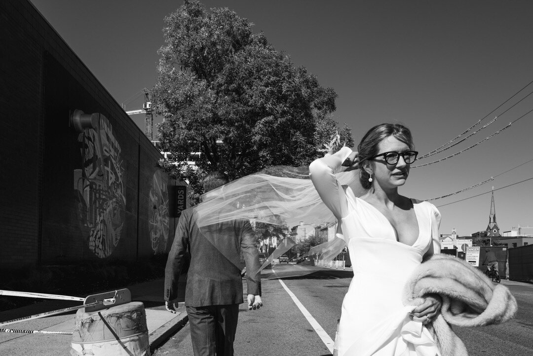 bride's veil blows in the wind