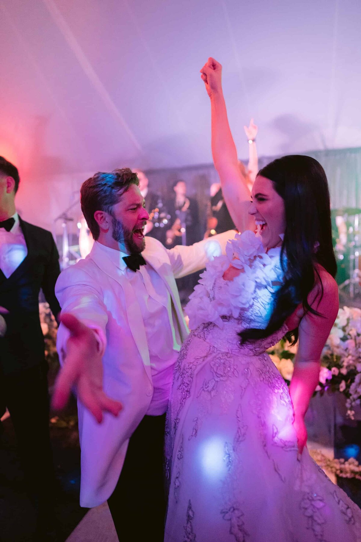 Bride and groom enjoying their dance party reception