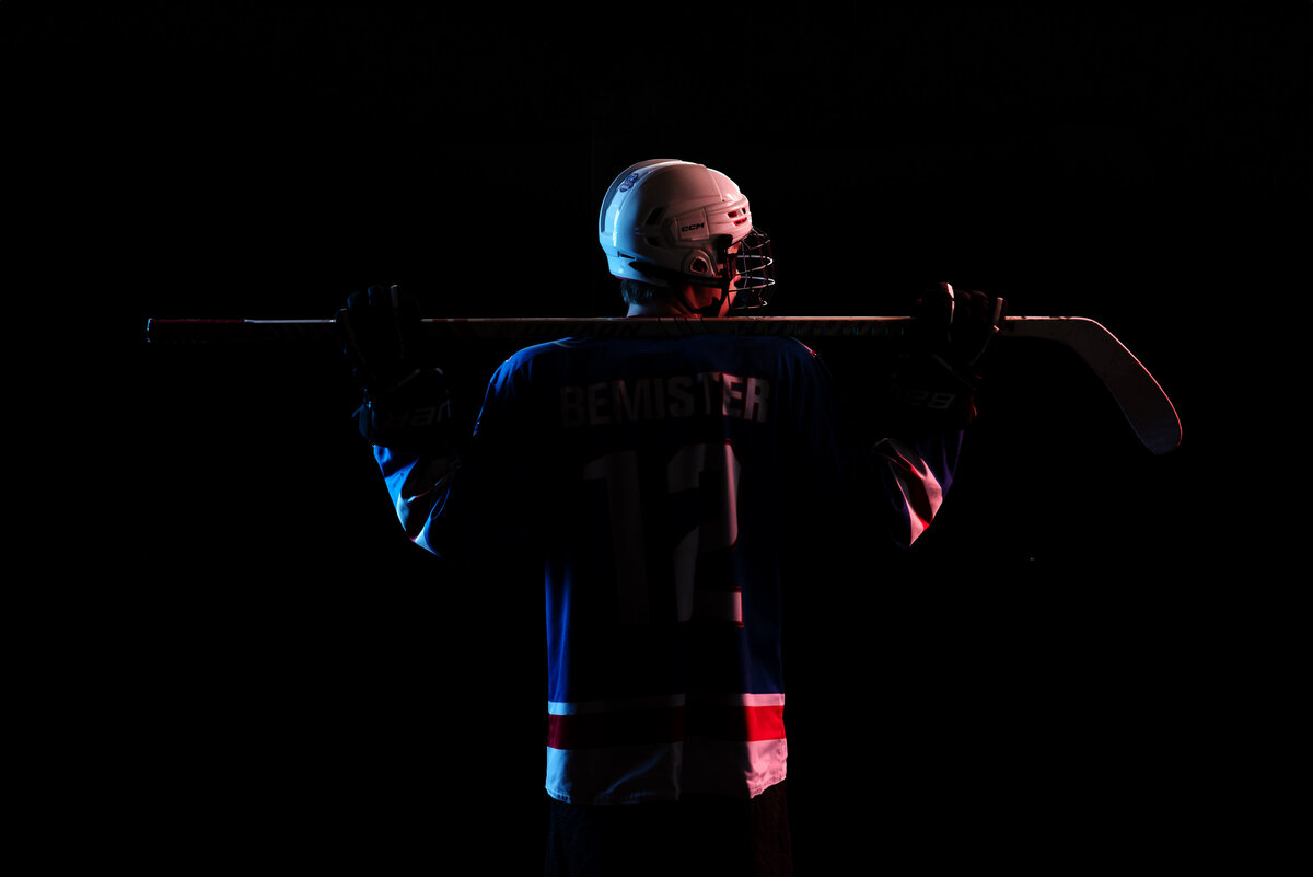 st-louis-senior-photographer-teen-hockey-player-with-dramatic-light