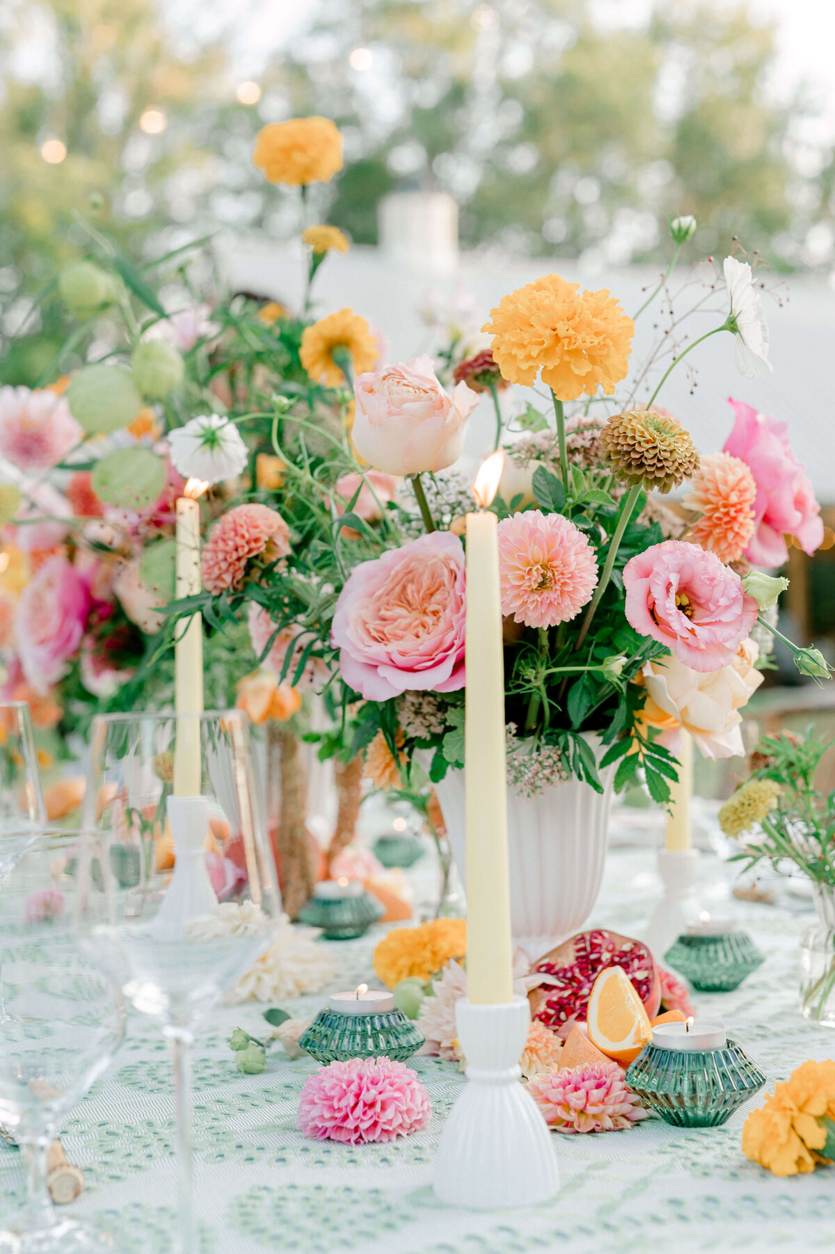A floral heavy peach and pink tablescape at the Larz Anderson House