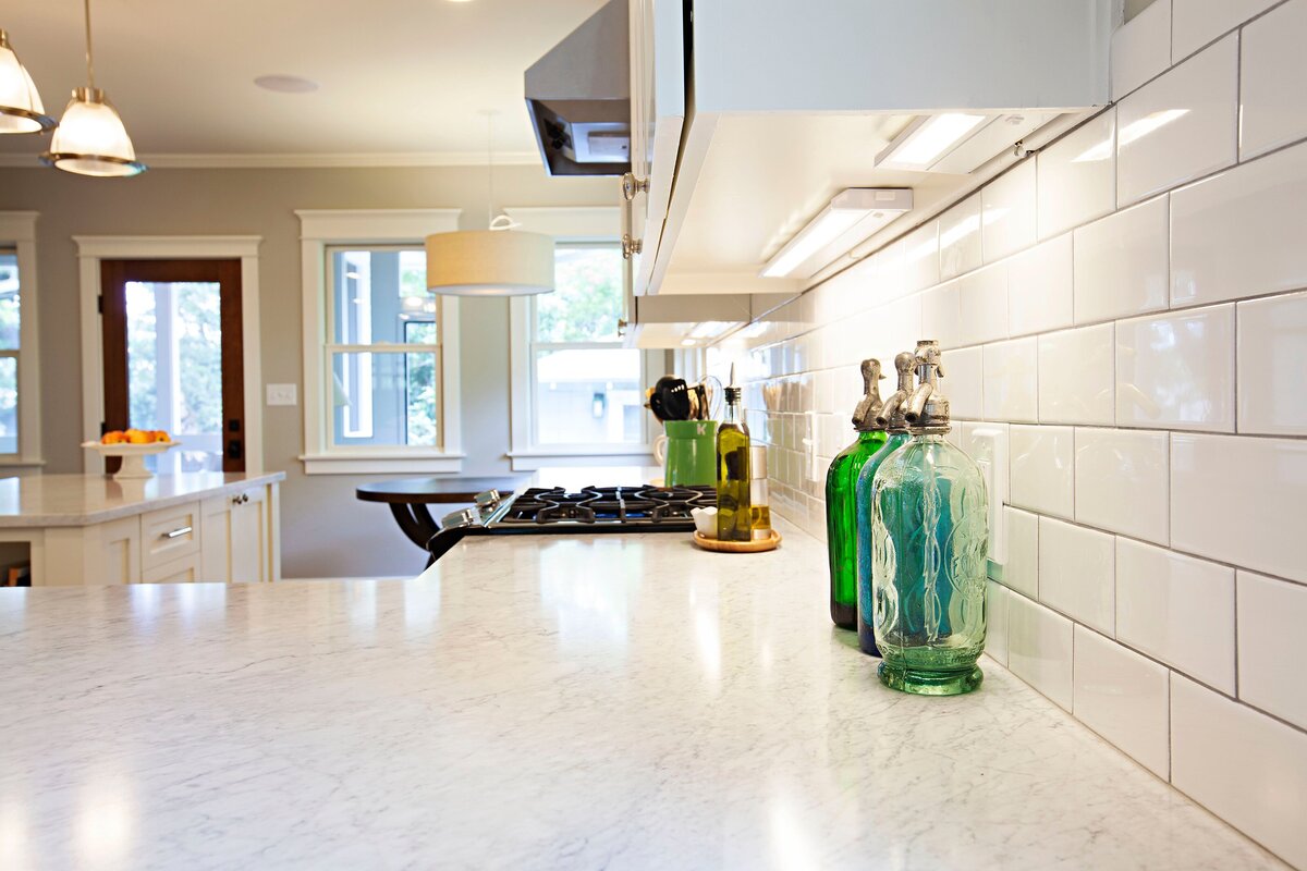 white tile backsplash in updated kitchen