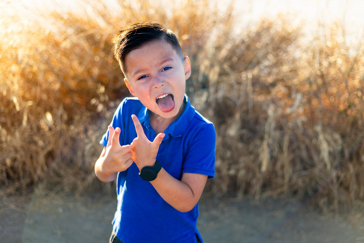 Boy making silly face and posing playfully in the sunshine – Bay Area School Photography Lifestyle – Ellobelle Photography