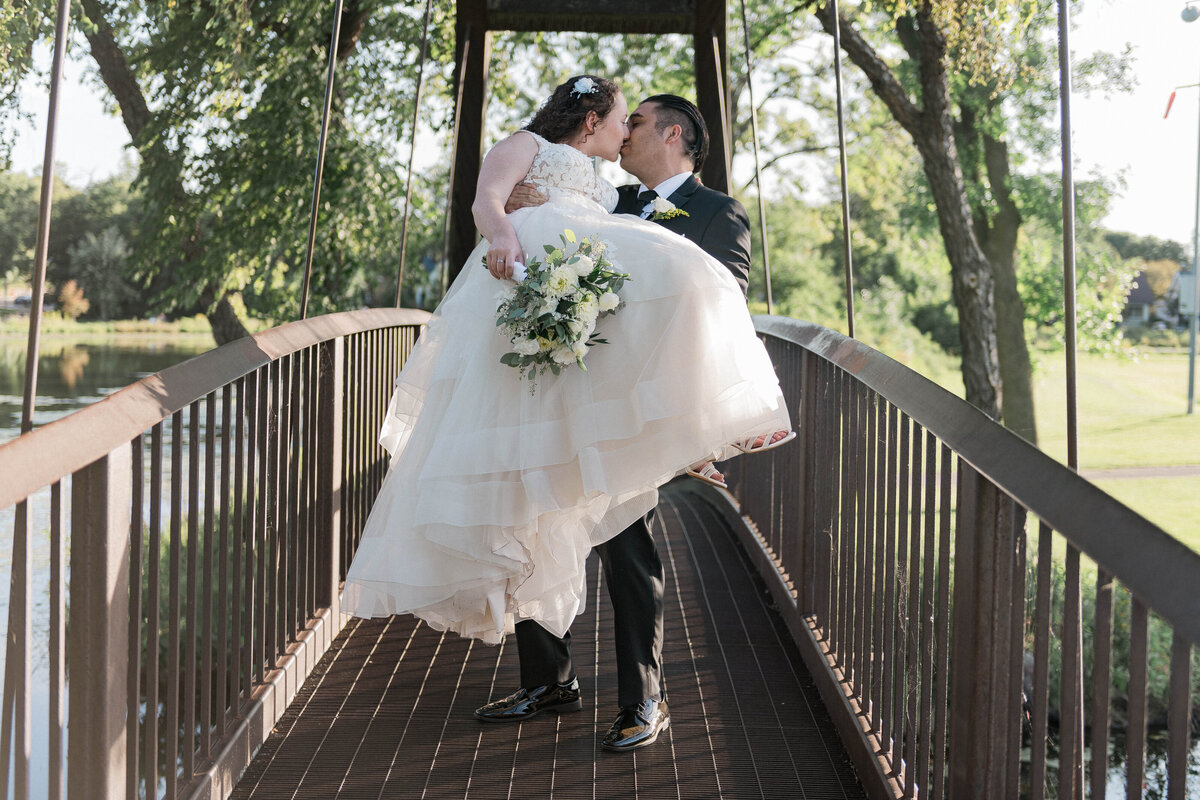 Floral wedding arch details in sunlight