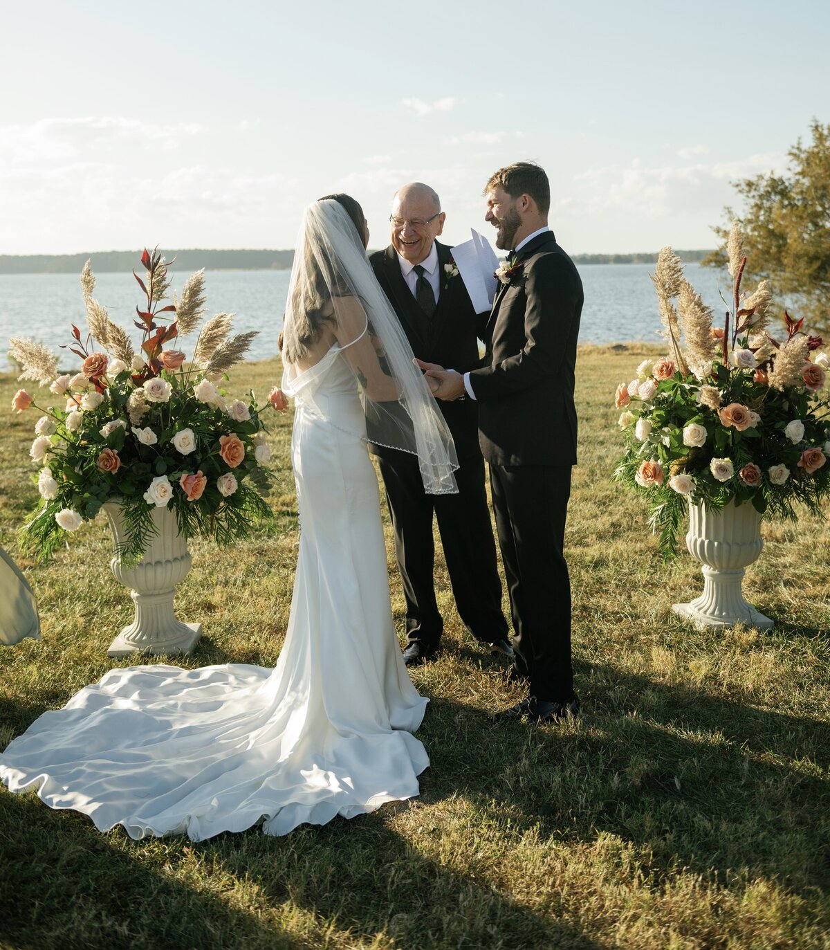 Garden style wedding flowers including garden roses and pampas grass. Ceremony floral arrangements for an intimate, waterfront wedding in Royal Oak, MD.