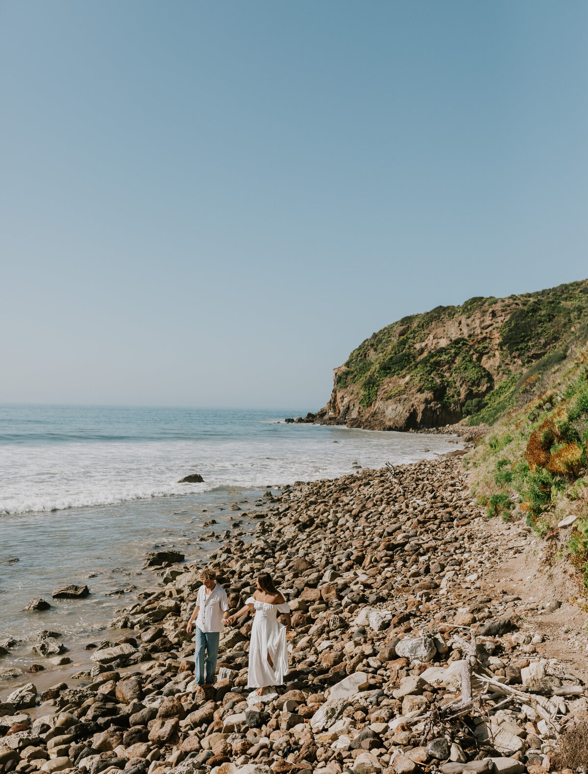 Couple on beach, relaxed Indiana engagement session.