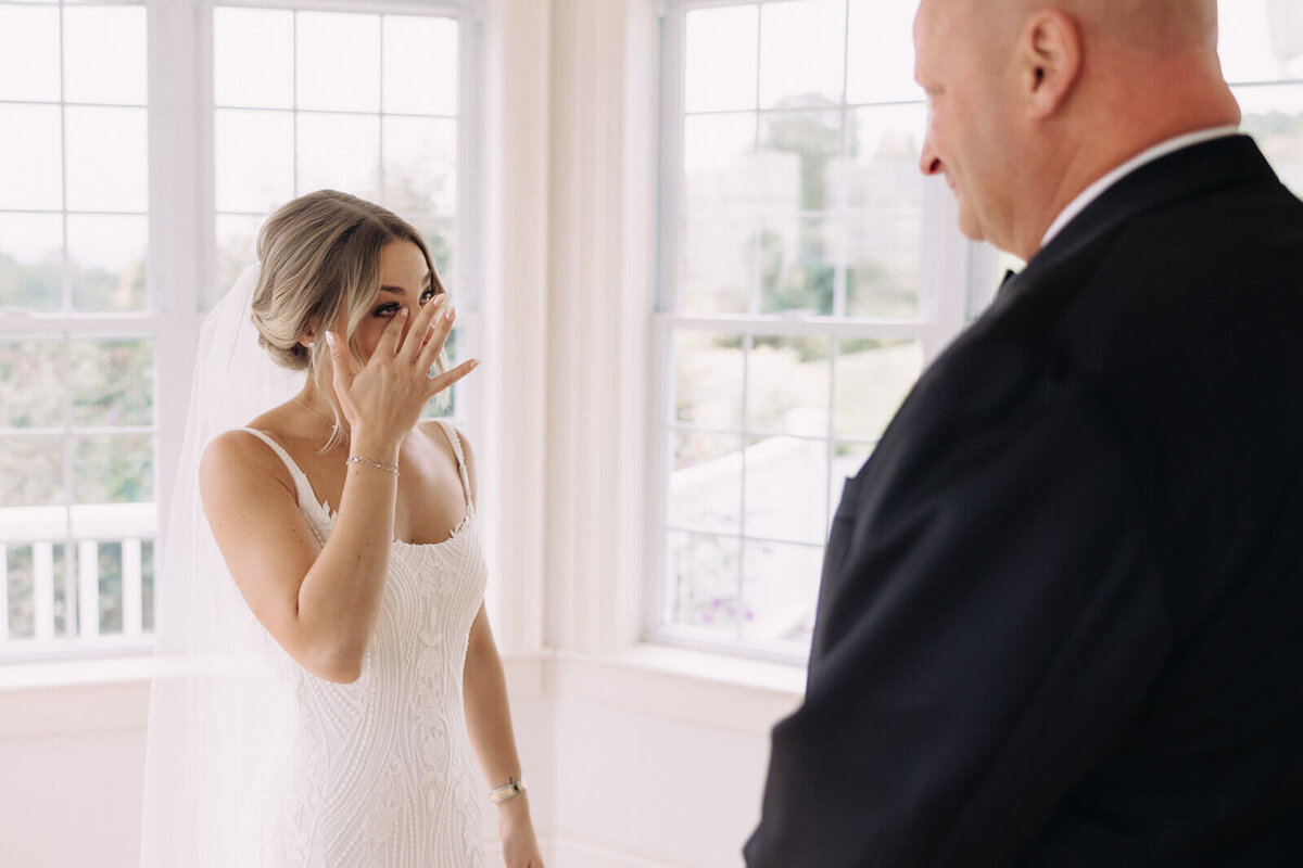 Brides first look with father