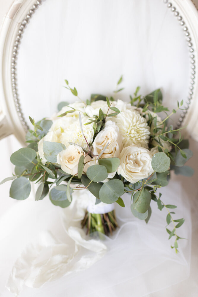 portrait of bride's wedding day bouquet - candlelight farms inn wedding