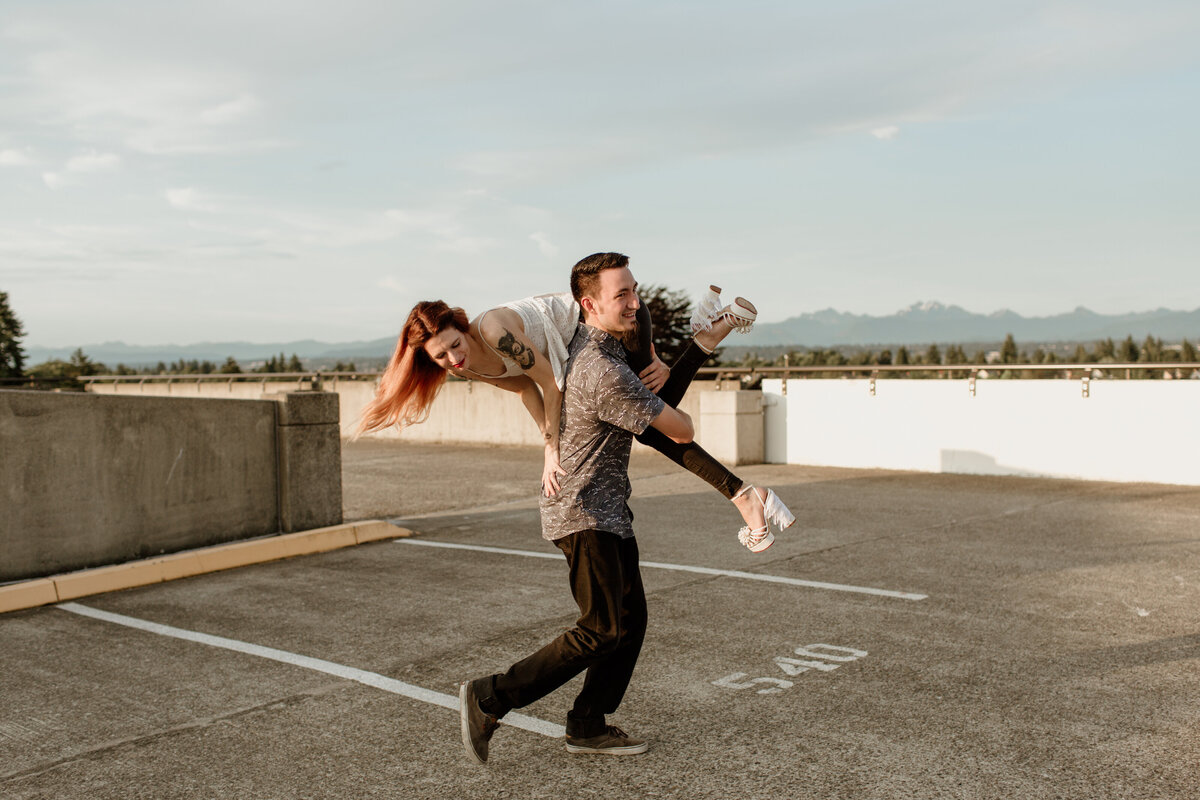 Rooftop parking garage engagement session captured by Fort Worth Wedding Photographer, Megan Christine Studio