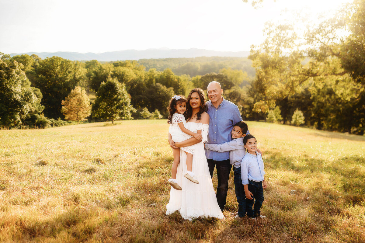 Family poses for portraits during Family Photos at Biltmore Estate in Asheville, NC.