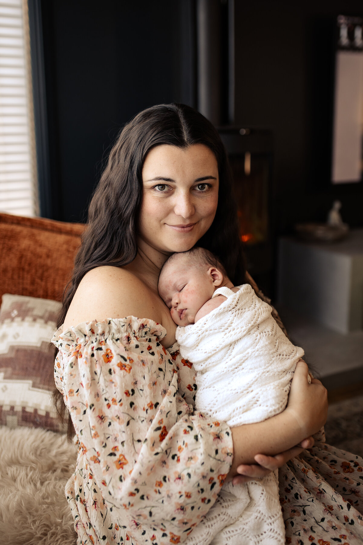 Newborn baby yawning peacefully in a cozy Hawke’s Bay home – heartwarming newborn photography by a local Hawke’s Bay photographer, capturing tender moments in Napier, Hastings, and Havelock North