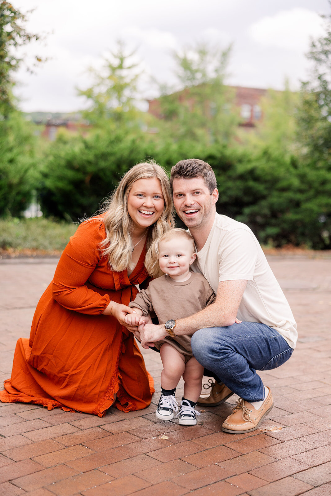Couple in a park in the Finger Lakes for a family session