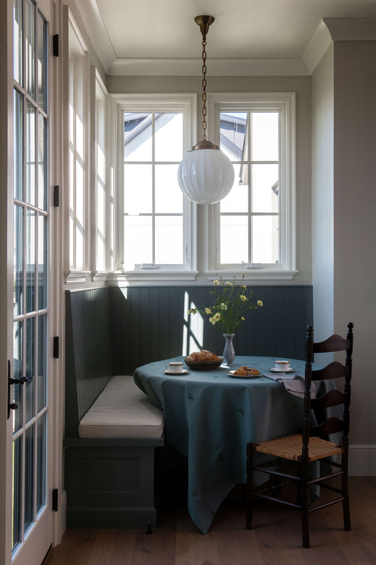 dutch-tudor-breakfast-nook-round-table-and-built-in-bench