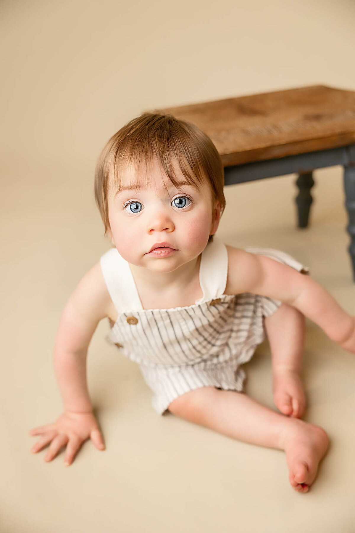 One year old with beautiful blue eyes.