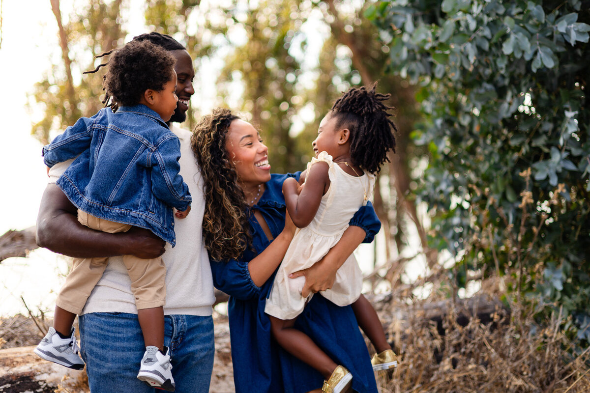 Parents holding children and laughing together outdoors, Bay Area Family Portfolio – Ellobelle Photography