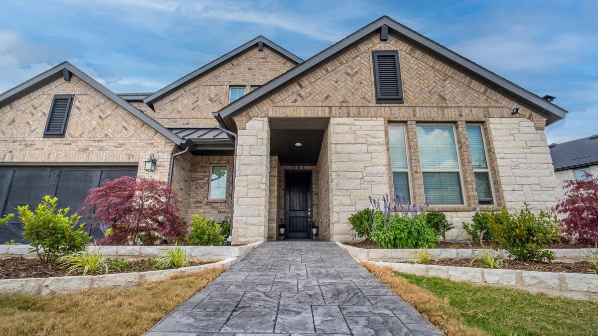 Front yard artificial turf installed by Dallas, TX turf experts at Elegance Outdoor Living.