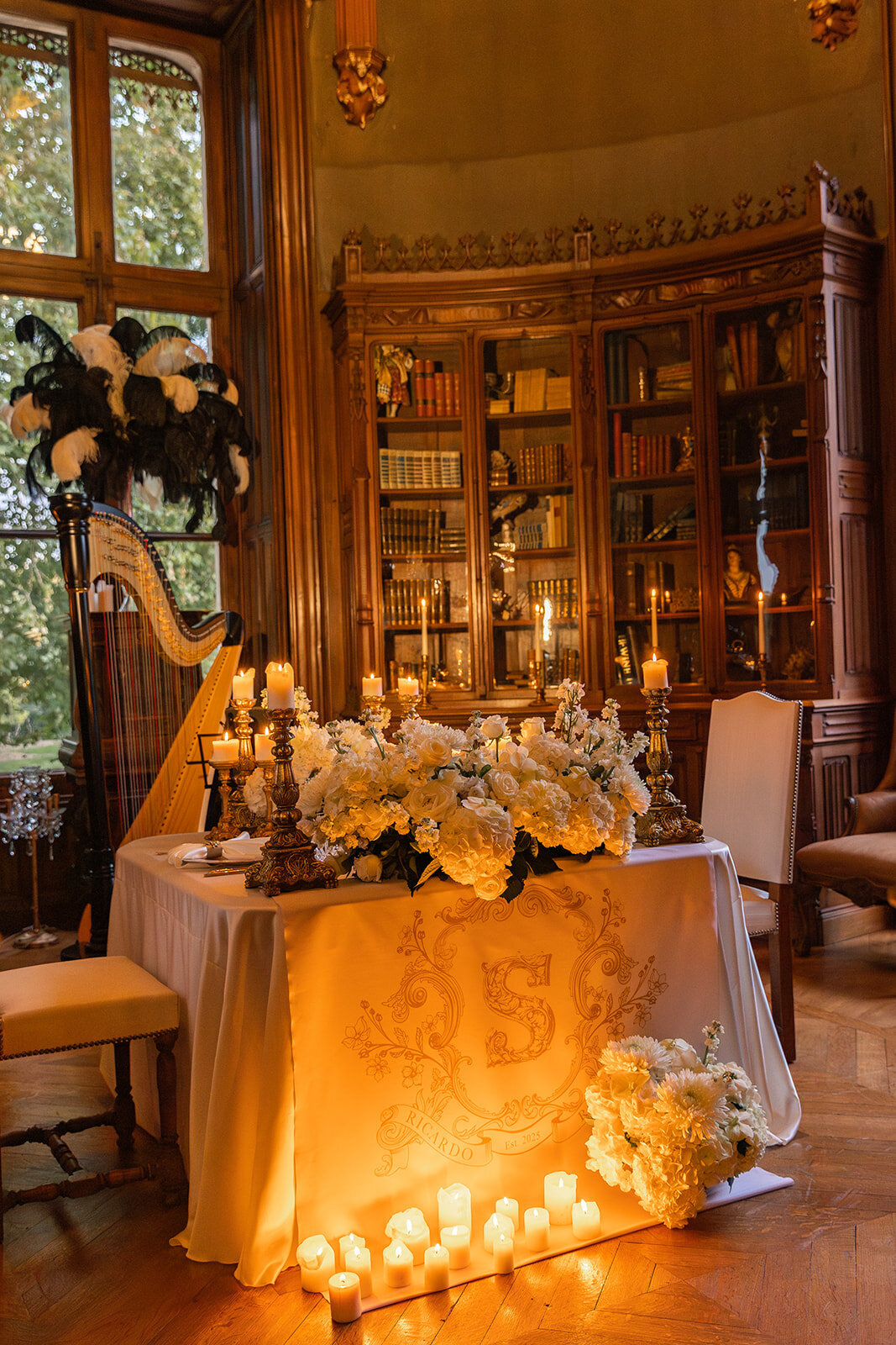 Warm, romantic candle-lit table setting photographed during a luxury Loire Valley elopement