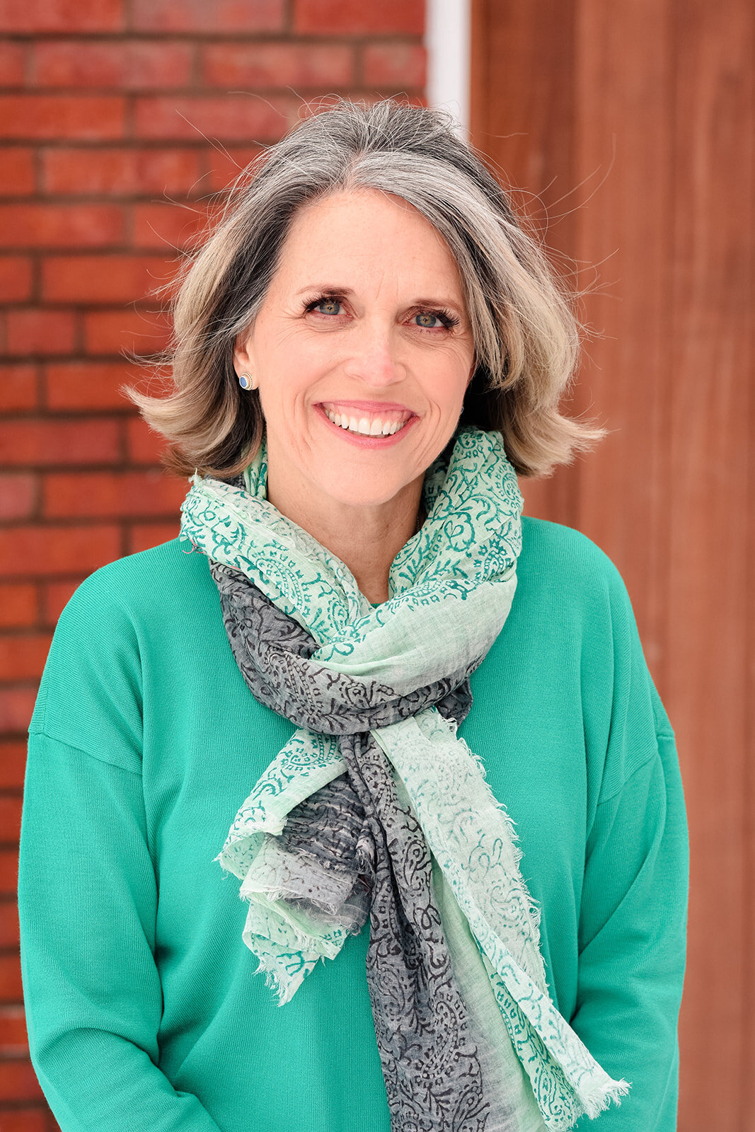 headshot mint green sweater