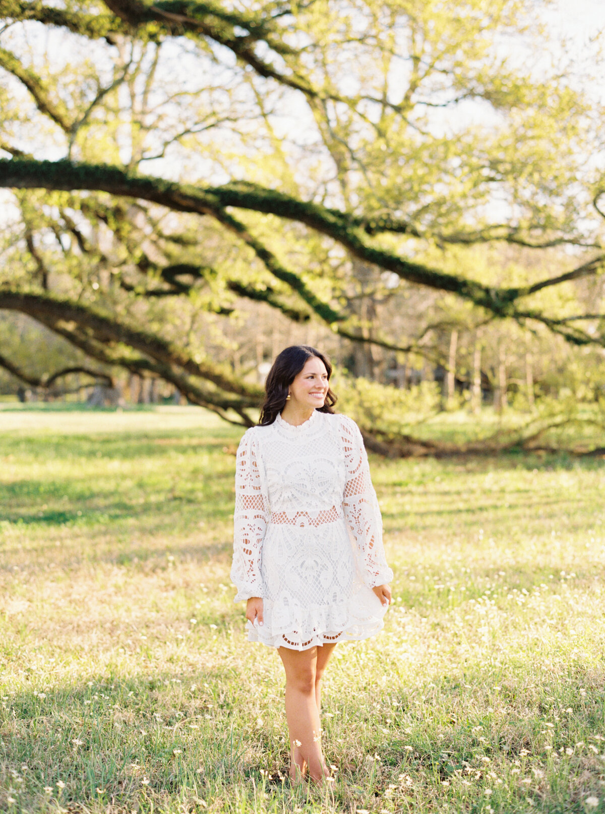 A stunning fall senior session bathed in warm, golden light amidst the beauty of autumn in Lafayette, LA, timelessly captured on film by Morgan Alysse, Louisiana film photographer.