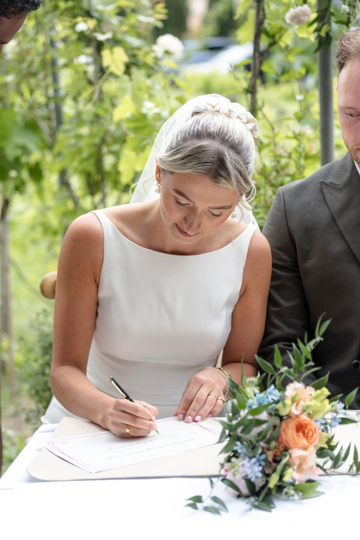 refined-french-bride-signing-marriage-document