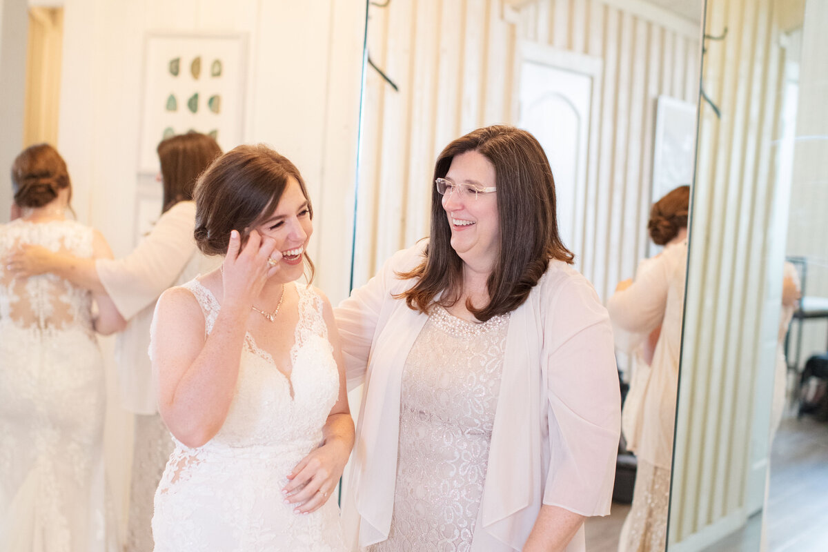 mother and bride candid in bridal suite at Milestone New Braunfels Texas wedding