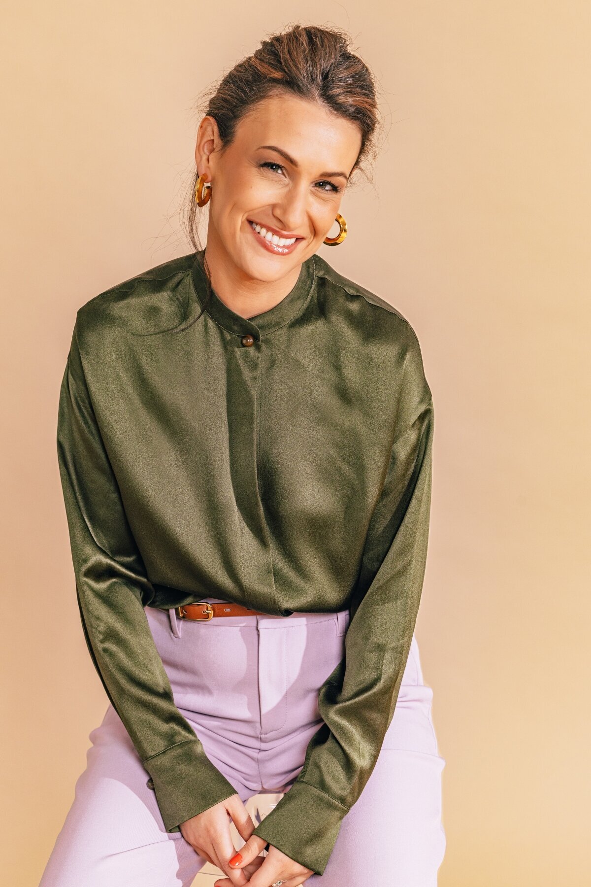 Julia Korn Green Blouse Smiling