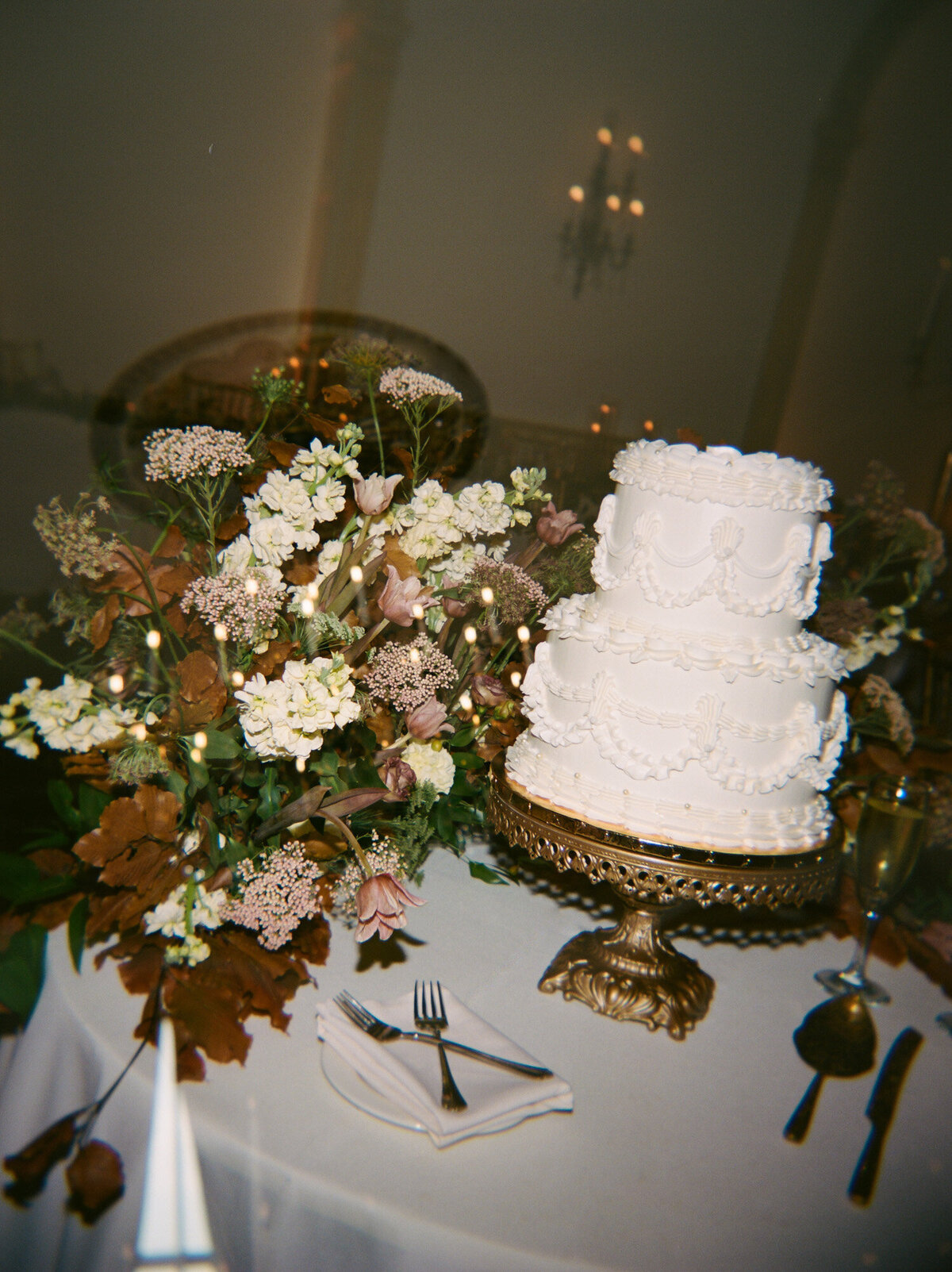 Natural film wedding photo of vintage wedding cake at The Colony Club, Detroit